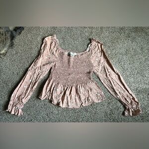 Long sleeved pink polka dot top in size small